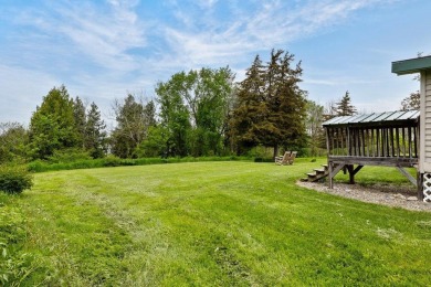 At the end of a quiet private road, sits this charming cedar on Alburg Golf Links in Vermont - for sale on GolfHomes.com, golf home, golf lot