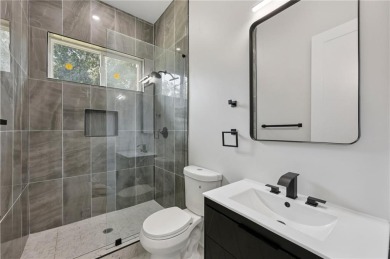 Experience modern luxury in this newly built custom farmhouse on East Lake Golf Club in Georgia - for sale on GolfHomes.com, golf home, golf lot