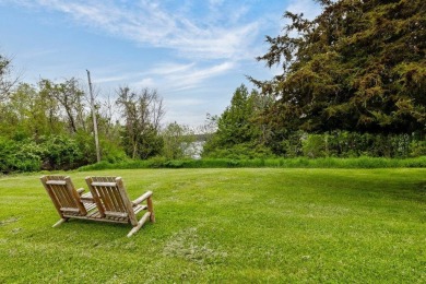 At the end of a quiet private road, sits this charming cedar on Alburg Golf Links in Vermont - for sale on GolfHomes.com, golf home, golf lot