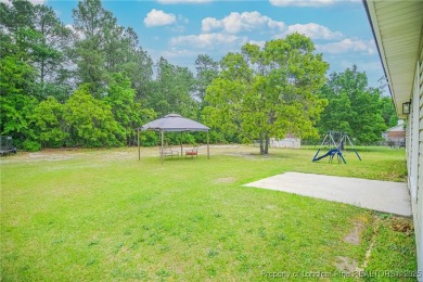 Welcome to this inviting 3-bedroom, 2-bathroom home nestled in on Hope Mills Golf and Country Club in North Carolina - for sale on GolfHomes.com, golf home, golf lot