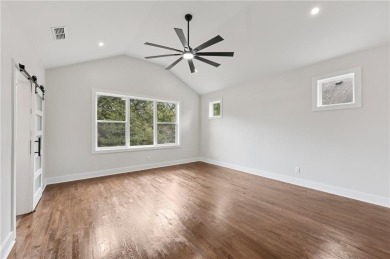 Experience modern luxury in this newly built custom farmhouse on East Lake Golf Club in Georgia - for sale on GolfHomes.com, golf home, golf lot