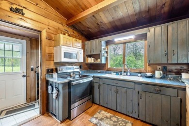 At the end of a quiet private road, sits this charming cedar on Alburg Golf Links in Vermont - for sale on GolfHomes.com, golf home, golf lot