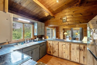 At the end of a quiet private road, sits this charming cedar on Alburg Golf Links in Vermont - for sale on GolfHomes.com, golf home, golf lot