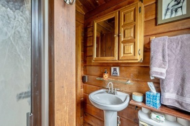 At the end of a quiet private road, sits this charming cedar on Alburg Golf Links in Vermont - for sale on GolfHomes.com, golf home, golf lot