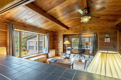 At the end of a quiet private road, sits this charming cedar on Alburg Golf Links in Vermont - for sale on GolfHomes.com, golf home, golf lot