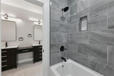 Experience modern luxury in this newly built custom farmhouse on East Lake Golf Club in Georgia - for sale on GolfHomes.com, golf home, golf lot