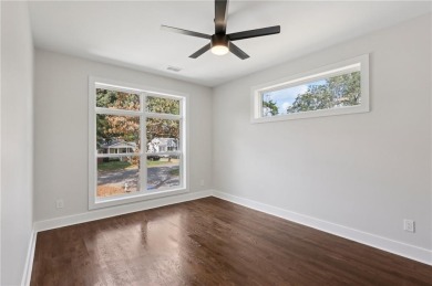 Experience modern luxury in this newly built custom farmhouse on East Lake Golf Club in Georgia - for sale on GolfHomes.com, golf home, golf lot