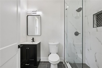 Experience modern luxury in this newly built custom farmhouse on East Lake Golf Club in Georgia - for sale on GolfHomes.com, golf home, golf lot