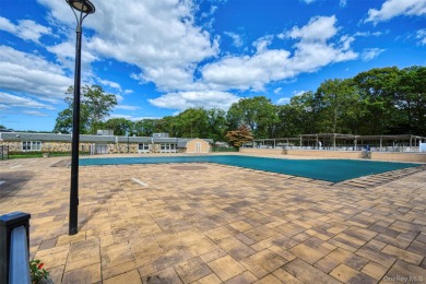 Move right into this beautiful 2-bedroom, 1-bathroom end-unit on Leisure Village Golf Course in New York - for sale on GolfHomes.com, golf home, golf lot
