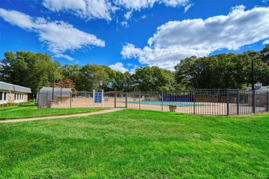 Move right into this beautiful 2-bedroom, 1-bathroom end-unit on Leisure Village Golf Course in New York - for sale on GolfHomes.com, golf home, golf lot