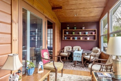 At the end of a quiet private road, sits this charming cedar on Alburg Golf Links in Vermont - for sale on GolfHomes.com, golf home, golf lot