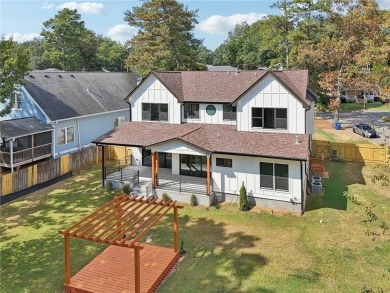 Experience modern luxury in this newly built custom farmhouse on East Lake Golf Club in Georgia - for sale on GolfHomes.com, golf home, golf lot