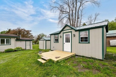 At the end of a quiet private road, sits this charming cedar on Alburg Golf Links in Vermont - for sale on GolfHomes.com, golf home, golf lot