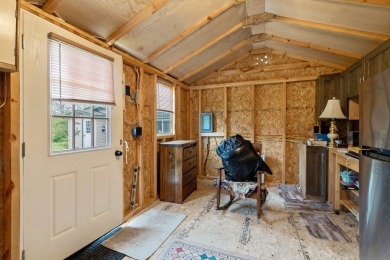 At the end of a quiet private road, sits this charming cedar on Alburg Golf Links in Vermont - for sale on GolfHomes.com, golf home, golf lot