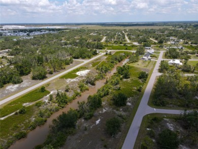 This is a nice building lot in a bit of a rural area of Punta on Live Oak Golf Club and RV Park in Florida - for sale on GolfHomes.com, golf home, golf lot