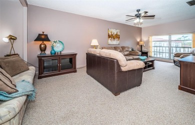 This 2-bedroom, 1.5-bath condo comes fully furnished and on The Dunedin Country Club in Florida - for sale on GolfHomes.com, golf home, golf lot