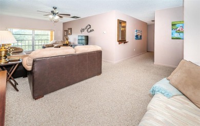 This 2-bedroom, 1.5-bath condo comes fully furnished and on The Dunedin Country Club in Florida - for sale on GolfHomes.com, golf home, golf lot