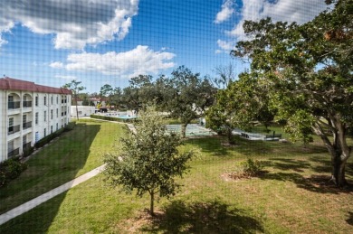 This 2-bedroom, 1.5-bath condo comes fully furnished and on The Dunedin Country Club in Florida - for sale on GolfHomes.com, golf home, golf lot