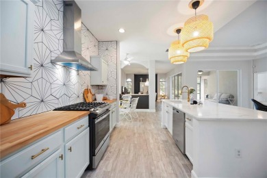 PRICE REDUCTION! BRAND NEW ROOF AND PLETHORA OF UPGRADES! This on University Park Country Club in Florida - for sale on GolfHomes.com, golf home, golf lot