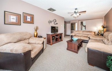This 2-bedroom, 1.5-bath condo comes fully furnished and on The Dunedin Country Club in Florida - for sale on GolfHomes.com, golf home, golf lot
