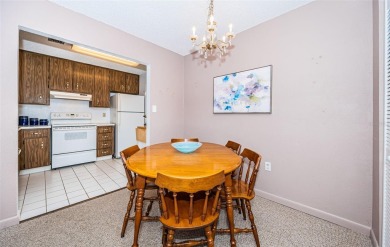 This 2-bedroom, 1.5-bath condo comes fully furnished and on The Dunedin Country Club in Florida - for sale on GolfHomes.com, golf home, golf lot