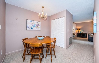 This 2-bedroom, 1.5-bath condo comes fully furnished and on The Dunedin Country Club in Florida - for sale on GolfHomes.com, golf home, golf lot