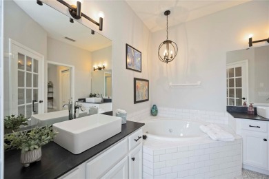 PRICE REDUCTION! BRAND NEW ROOF AND PLETHORA OF UPGRADES! This on University Park Country Club in Florida - for sale on GolfHomes.com, golf home, golf lot