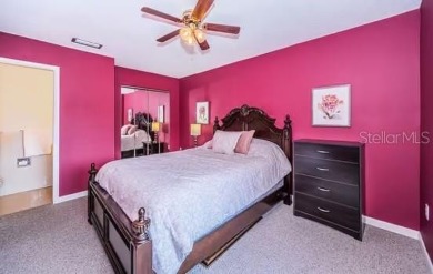 This 2-bedroom, 1.5-bath condo comes fully furnished and on The Dunedin Country Club in Florida - for sale on GolfHomes.com, golf home, golf lot