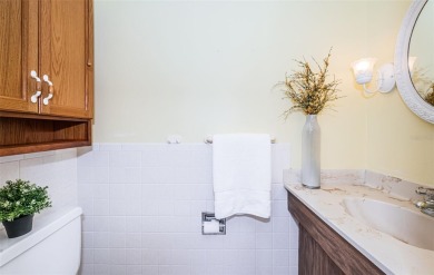 This 2-bedroom, 1.5-bath condo comes fully furnished and on The Dunedin Country Club in Florida - for sale on GolfHomes.com, golf home, golf lot
