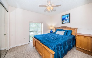 This 2-bedroom, 1.5-bath condo comes fully furnished and on The Dunedin Country Club in Florida - for sale on GolfHomes.com, golf home, golf lot