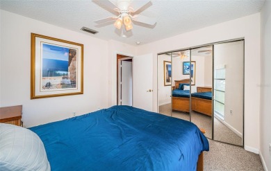 This 2-bedroom, 1.5-bath condo comes fully furnished and on The Dunedin Country Club in Florida - for sale on GolfHomes.com, golf home, golf lot