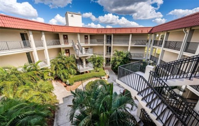 This 2-bedroom, 1.5-bath condo comes fully furnished and on The Dunedin Country Club in Florida - for sale on GolfHomes.com, golf home, golf lot