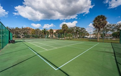 This 2-bedroom, 1.5-bath condo comes fully furnished and on The Dunedin Country Club in Florida - for sale on GolfHomes.com, golf home, golf lot