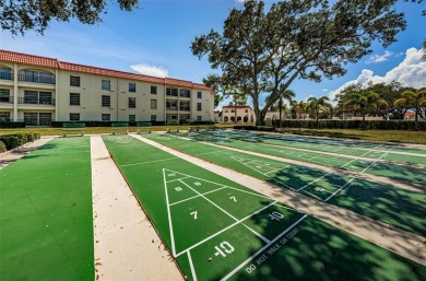 This 2-bedroom, 1.5-bath condo comes fully furnished and on The Dunedin Country Club in Florida - for sale on GolfHomes.com, golf home, golf lot