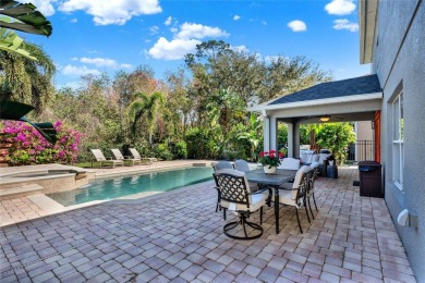 Welcome to this stunning pool home nestled in the exclusive on Eagle Creek Golf Club in Florida - for sale on GolfHomes.com, golf home, golf lot