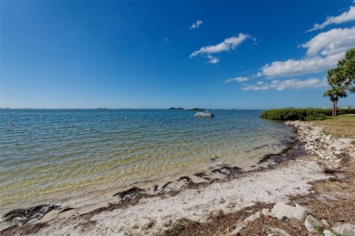 This 2-bedroom, 1.5-bath condo comes fully furnished and on The Dunedin Country Club in Florida - for sale on GolfHomes.com, golf home, golf lot
