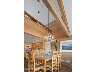 This beautifully updated two-bedroom, two-bath townhome with a on Jackson Hole Golf and Tennis Club in Wyoming - for sale on GolfHomes.com, golf home, golf lot