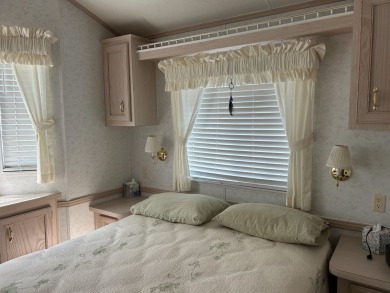 This a one bedroom and one bath with very a large addition on Silver Dollar Golf and Trap Club in Florida - for sale on GolfHomes.com, golf home, golf lot