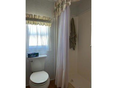 This a one bedroom and one bath with very a large addition on Silver Dollar Golf and Trap Club in Florida - for sale on GolfHomes.com, golf home, golf lot