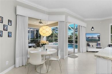 Awaken to golden sunrises glimmering across the lake and on  in Florida - for sale on GolfHomes.com, golf home, golf lot