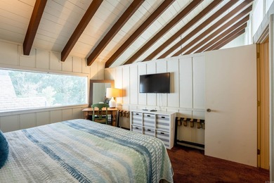 This FURNISHED Eden Isle townhome is right across the street on Red Apple Inn and Country Club in Arkansas - for sale on GolfHomes.com, golf home, golf lot