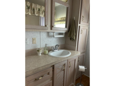 This a one bedroom and one bath with very a large addition on Silver Dollar Golf and Trap Club in Florida - for sale on GolfHomes.com, golf home, golf lot