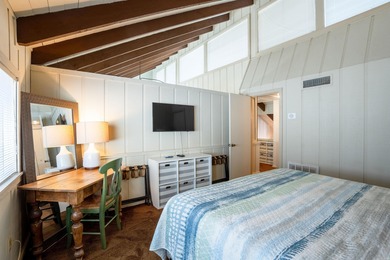 This FURNISHED Eden Isle townhome is right across the street on Red Apple Inn and Country Club in Arkansas - for sale on GolfHomes.com, golf home, golf lot