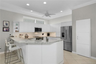 Awaken to golden sunrises glimmering across the lake and on  in Florida - for sale on GolfHomes.com, golf home, golf lot
