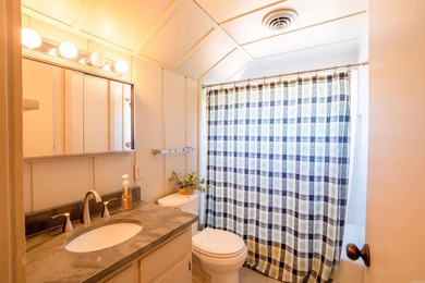 This FURNISHED Eden Isle townhome is right across the street on Red Apple Inn and Country Club in Arkansas - for sale on GolfHomes.com, golf home, golf lot
