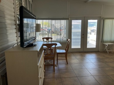 This a one bedroom and one bath with very a large addition on Silver Dollar Golf and Trap Club in Florida - for sale on GolfHomes.com, golf home, golf lot