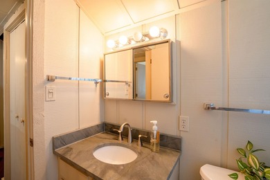 This FURNISHED Eden Isle townhome is right across the street on Red Apple Inn and Country Club in Arkansas - for sale on GolfHomes.com, golf home, golf lot