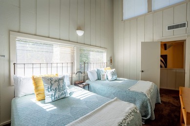 This FURNISHED Eden Isle townhome is right across the street on Red Apple Inn and Country Club in Arkansas - for sale on GolfHomes.com, golf home, golf lot