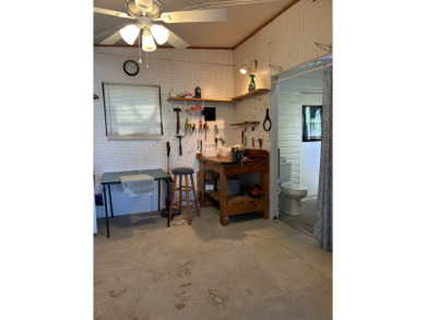 This a one bedroom and one bath with very a large addition on Silver Dollar Golf and Trap Club in Florida - for sale on GolfHomes.com, golf home, golf lot