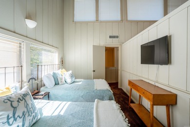 This FURNISHED Eden Isle townhome is right across the street on Red Apple Inn and Country Club in Arkansas - for sale on GolfHomes.com, golf home, golf lot